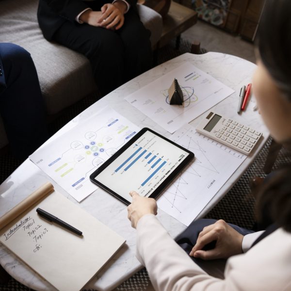 business-people-working-with-ipad-high-angle