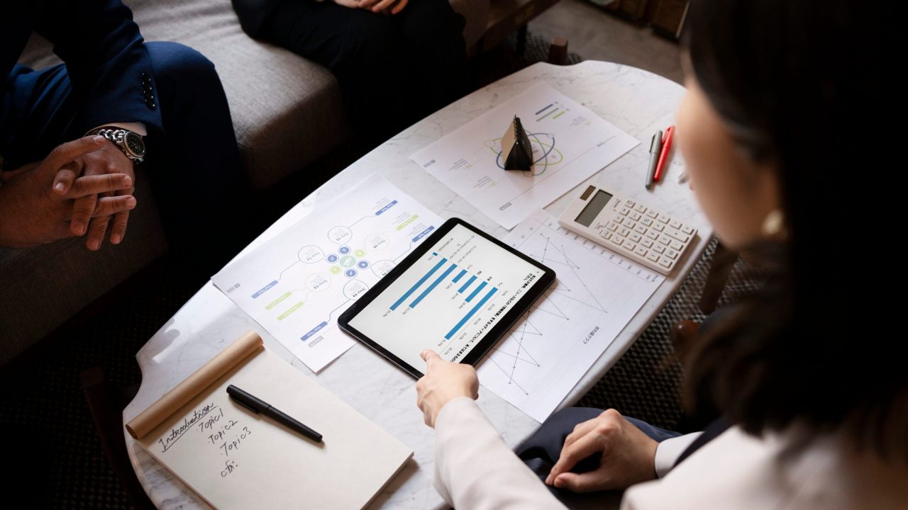 business-people-working-with-ipad-high-angle