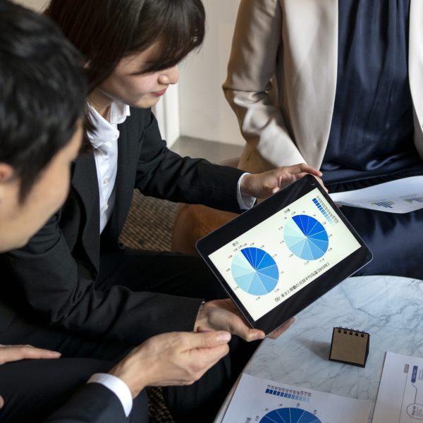 business-people-working-with-ipad-side-view